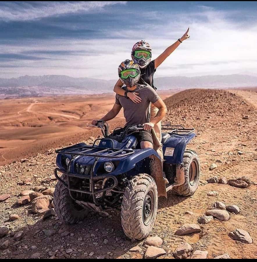 Marrakech: Agafay Desert Quad, Camel Ride & Dinner Show - Quad biking across rocky tracks