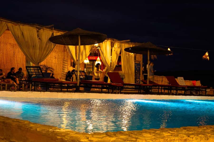 Marrakech: Agafay Desert Quad, Camel Ride & Dinner Show - Pickup, transport, and the argan oil stop