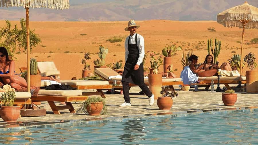 Marrakech: Agafay Desert Quad Camel Rides, Pool, Dinner Show - Pool time in a desert setting