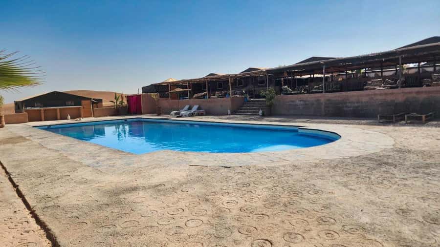 Marrakech: Agafay Desert Sunset Camel Ride, Quad & Dinner - Pool time at the Berber camp