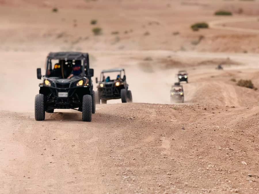 Marrakech: Agafay Dinner Show, Camel Ride, Quad, or Buggy - From Marrakech to the rocky Agafay Desert