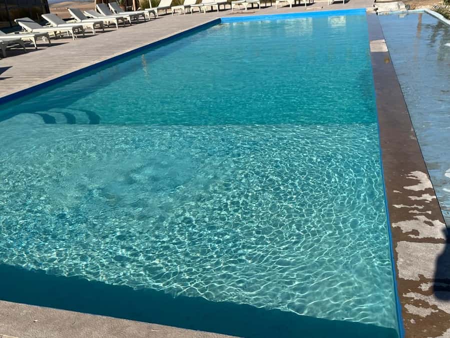 Marrakech: Agafay Dinner Show with Quad/Camel Ride and Pool - A Desert Pool Before Sunset