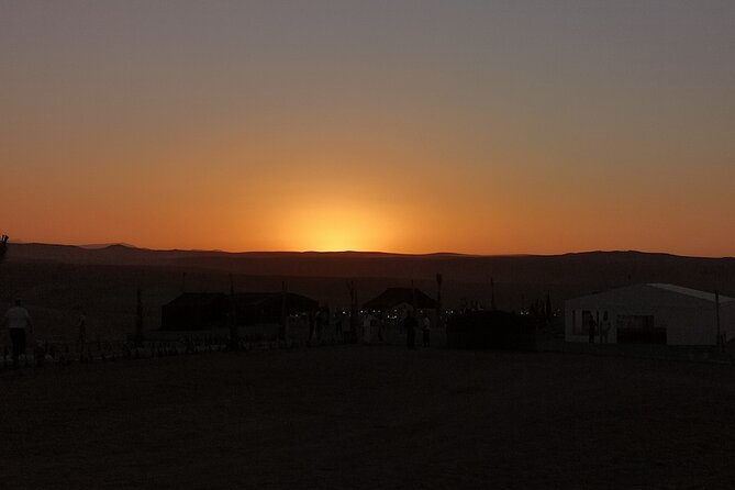 Marrakech: Camels & Quads on Sunset and Luxury Dinner with Show - Music, fire, and a lively finish
