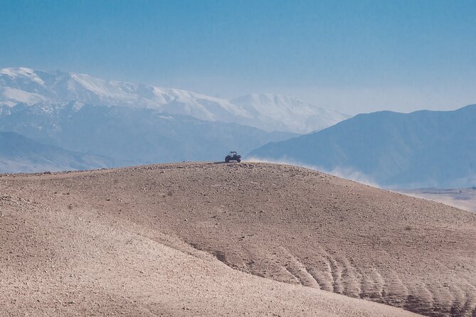 Marrakech Desert Buggy Tour Including Berber Tea Break and transfer - Stop One: A Small Oasis and the Dunes and Desert Base