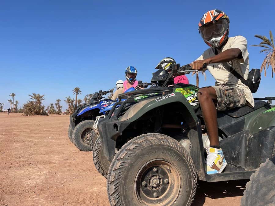 Marrakech: Quad Bike and Camel Ride Tour - A camel ride with a Moroccan photo stop