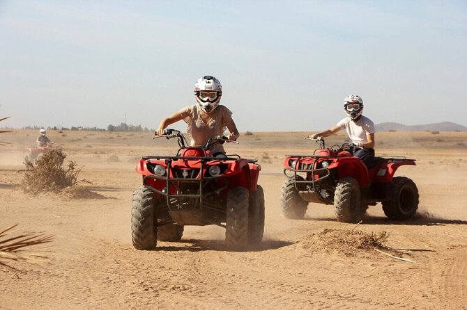 Merzouga Desert Quad bike Adventure with Sand boarding - Feeding a Camel Before the Ride