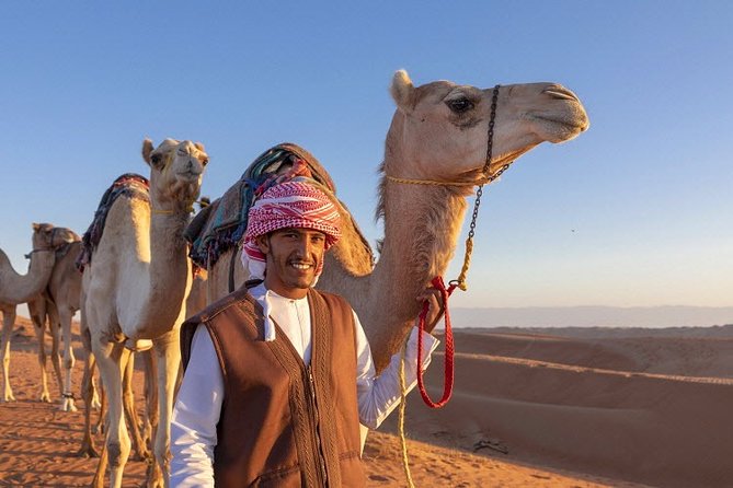 Morning Desert Safari with Quad Bike, Camel Ride & Sandboarding - A 20-minute camel ride with a traditional feel