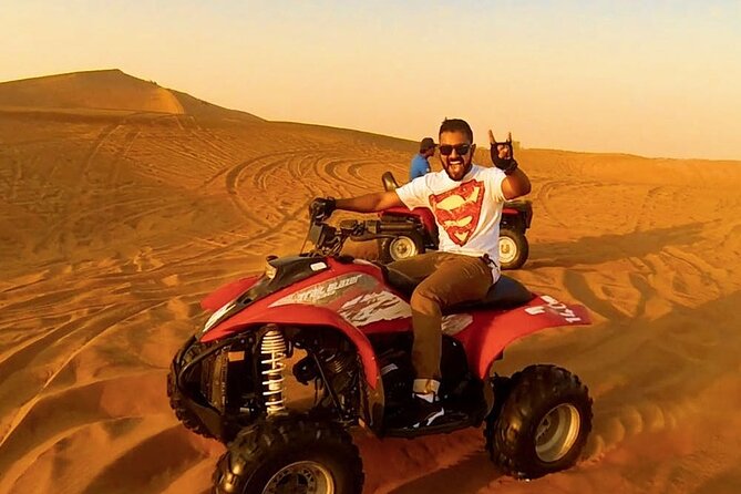 Morning Desert Safari with Quad Bike, Camel Ride & Sandboarding - Dune bashing over Lahbab’s red dunes