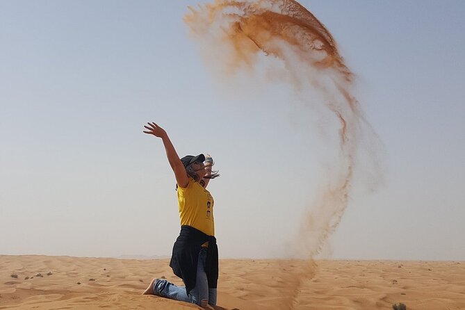 Morning Dubai desert safari - camel rides, quad bikes, dune buggies,dune bashing - Sandboarding gives you a quieter desert moment