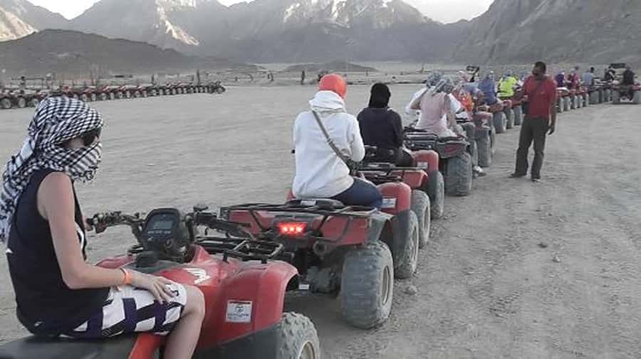 Morning Trip: Desert Safari Riding a Speed Quad Bike, Pickup - Shisha, tea, and what is not included