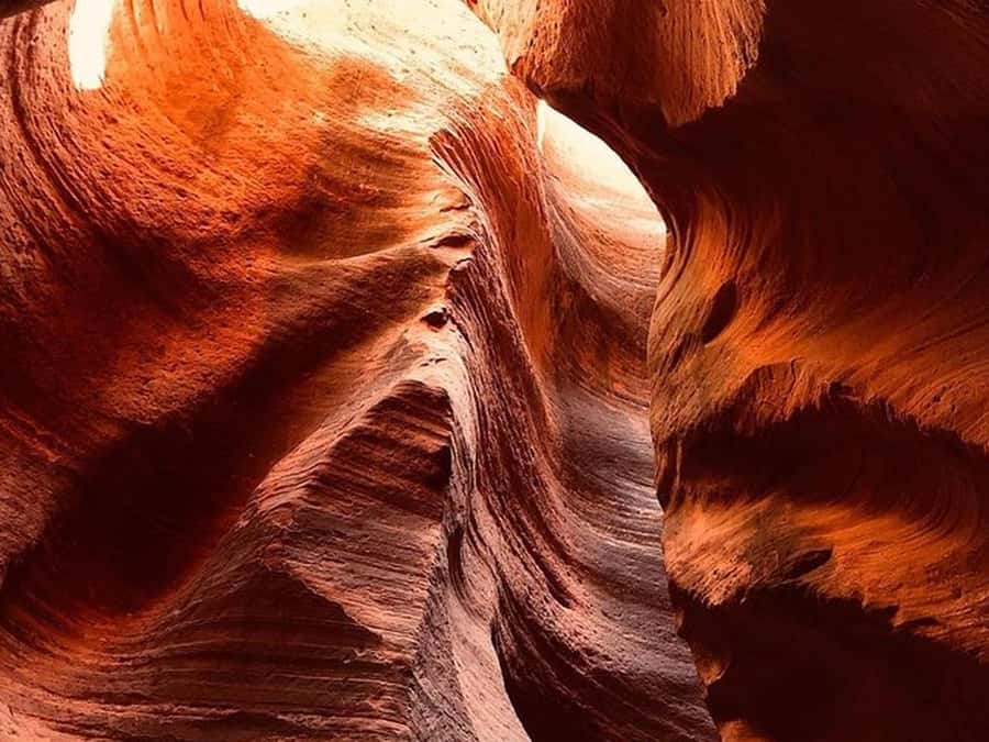 Orderville: East Zion Slot Canyons Award-Winning UTV Tour - Walking into Upper and Lower Red Cave Slot Canyons