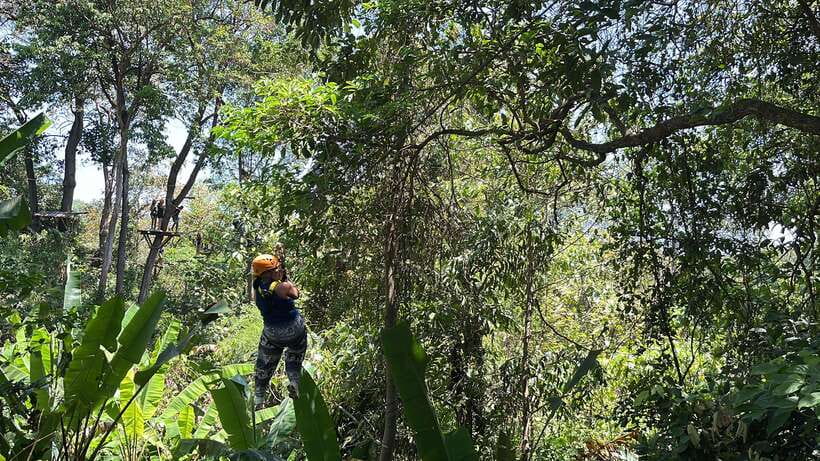 Phuket Ultimate Combo: Jungle ATV & Zipline Adventure - ATV riding through dirt, turns, and mud