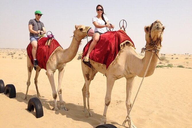 Premium Desert Safari Dubai: Desert Camping & Dune Bashing - Sunset photographs, sandboarding, and the best views