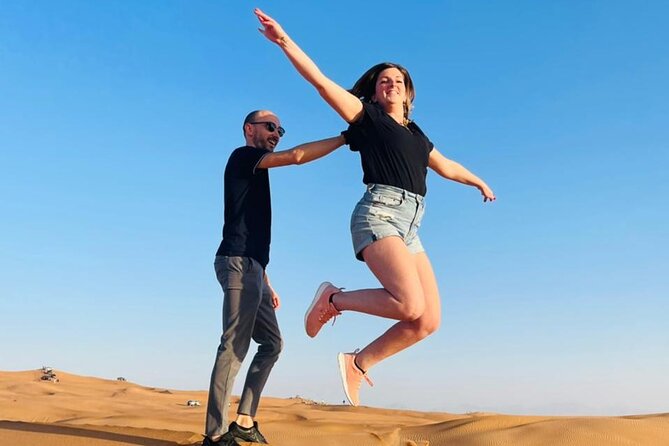 Premium Desert Safari Dubai : Dune Bashing, Camel Ride with BBQ - Four live shows and a relaxed camp atmosphere
