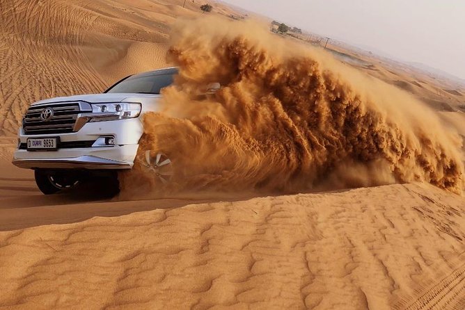 Private Morning Desert Safari Dubai with Dune Bashing & Sandboard - Camel riding: brief, traditional, and photogenic