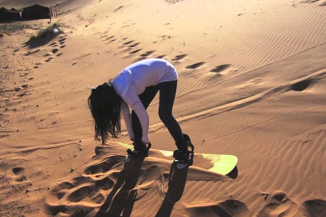Private Morning Desert Safari Dubai with Dune Bashing & Sandboard - Sandboarding on soft dunes