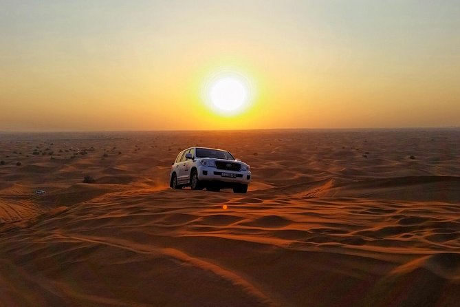 Private Morning Desert Safari Dubai with Dune Bashing & Sandboard - Sunrise over the Lahbab dunes