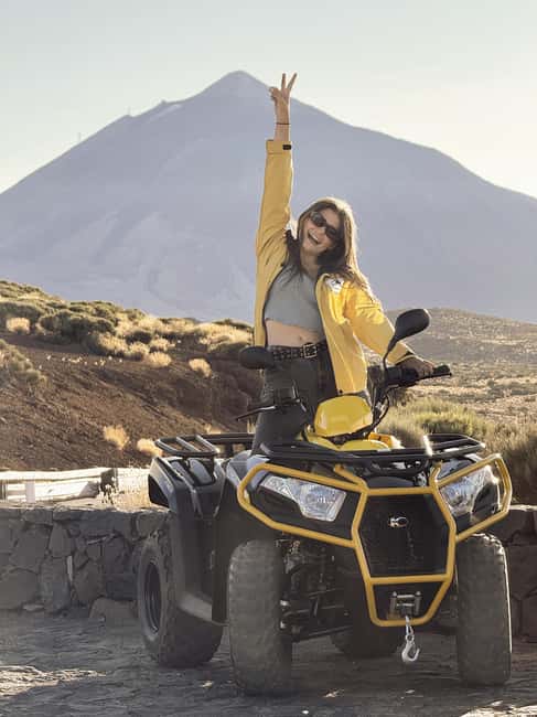 Puerto de la Cruz: Quad Tour to Teide at Sunset with Snack & Photos - Descending through golden and pink light