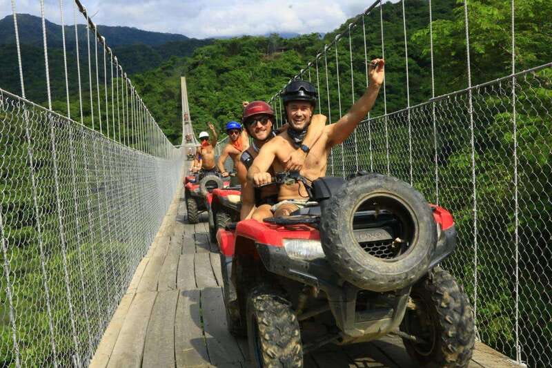 Puerto Vallarta: Jorullo Bridge ATV, Waterfall, Tequila Tour - Riding an ATV through subtropical mountain country