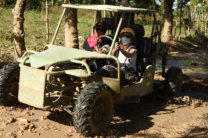 Punta Cana Buggy with Cave Dip, Mamajuana Tasting & Macao Beach - Starting the buggy ride through the countryside
