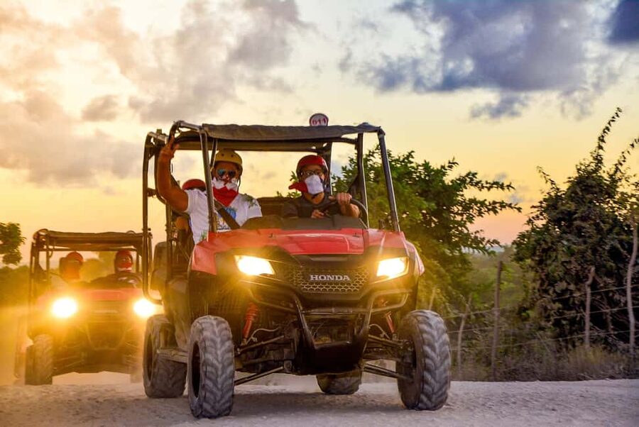 Punta Cana: Sunset Buggy Tour With Cave Swim and Dance Show - A night swim in a natural cenote