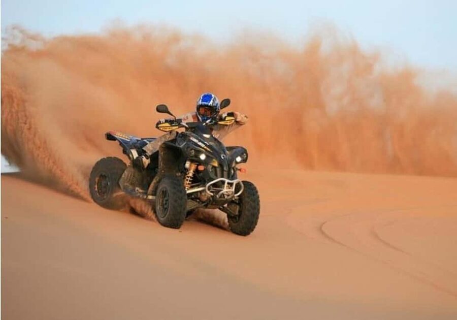 Qatar: ATV & Quad Dune Bashing, Camel Ride, & Sandboarding - Dune bashing with an experienced driver