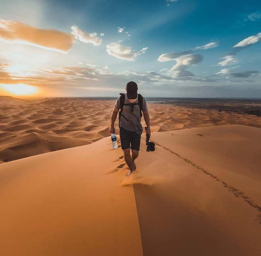 Quad Bike/Buggy, Desert Safari, Camel Ride, Dune Bashing - Sandboarding on the dunes