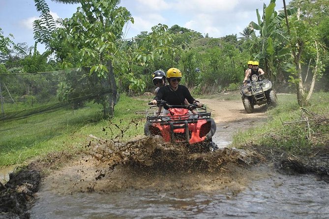 Quad Bike Ride and Snorkeling at Blue Lagoon Beach All-inclusive - The Ubud ATV course: mud, tunnels, and river crossings