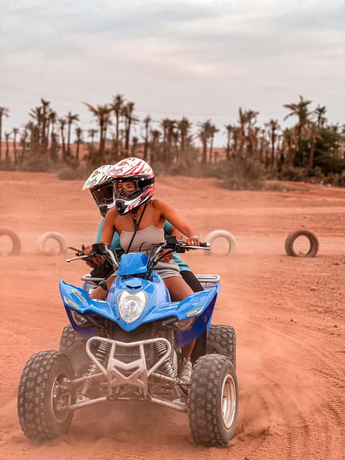Quad biking adventure in Marrakech - Sunset photos in the palm grove