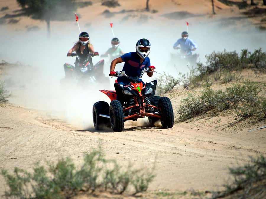 Ras Al Khaimah: Guided Quad Bike Tour - Sandboarding, camels, and the desert camp extras