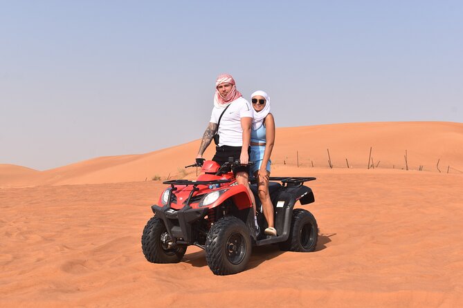 Sunset Desert Safari Quad bike Camel ride Sand Board & BBQ Dinner - Key things to know before booking