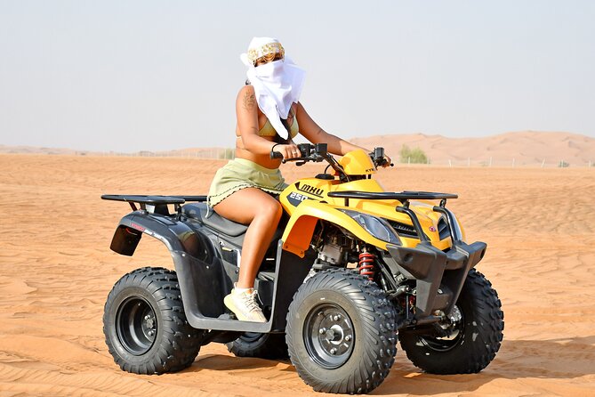 Sunset Desert Safari Quad bike Camel ride Sand Board & BBQ Dinner - Moving to Al Awir for the camp evening