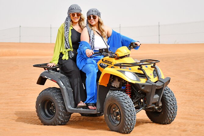 Sunset Desert Safari Quad bike Camel ride Sand Board & BBQ Dinner - Four live shows and Arabic music