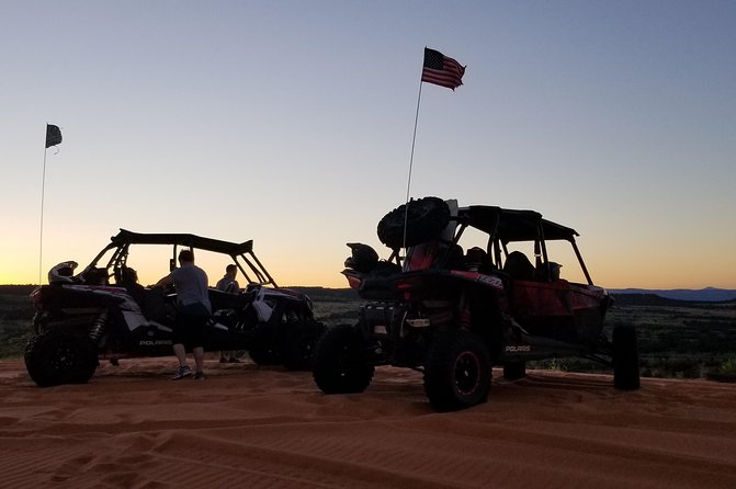 Sunset Sandboarding Peekaboo Slot Canyon UTV Adventure (Private) - Sunset sandboarding on the dunes