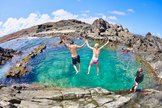 ThrillSeekers: Aruba UTV Tour & Cliff Jump at Natural Pool - Alto Vista Chapel and a small local pause