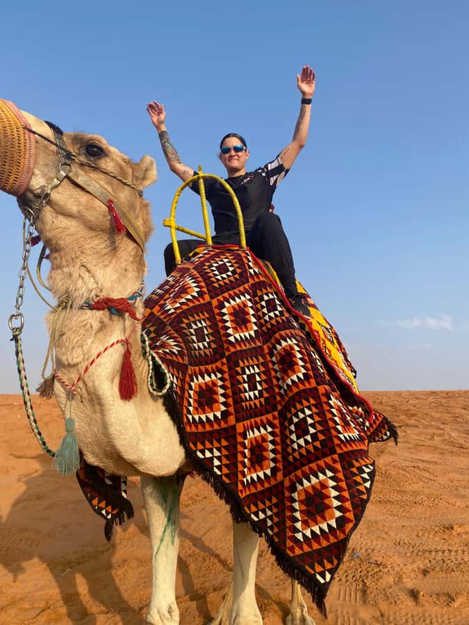 VIP Red Dunes: Camel, Quads, Private Tour & Coffee - Camel riding: a short, photo-friendly desert tradition